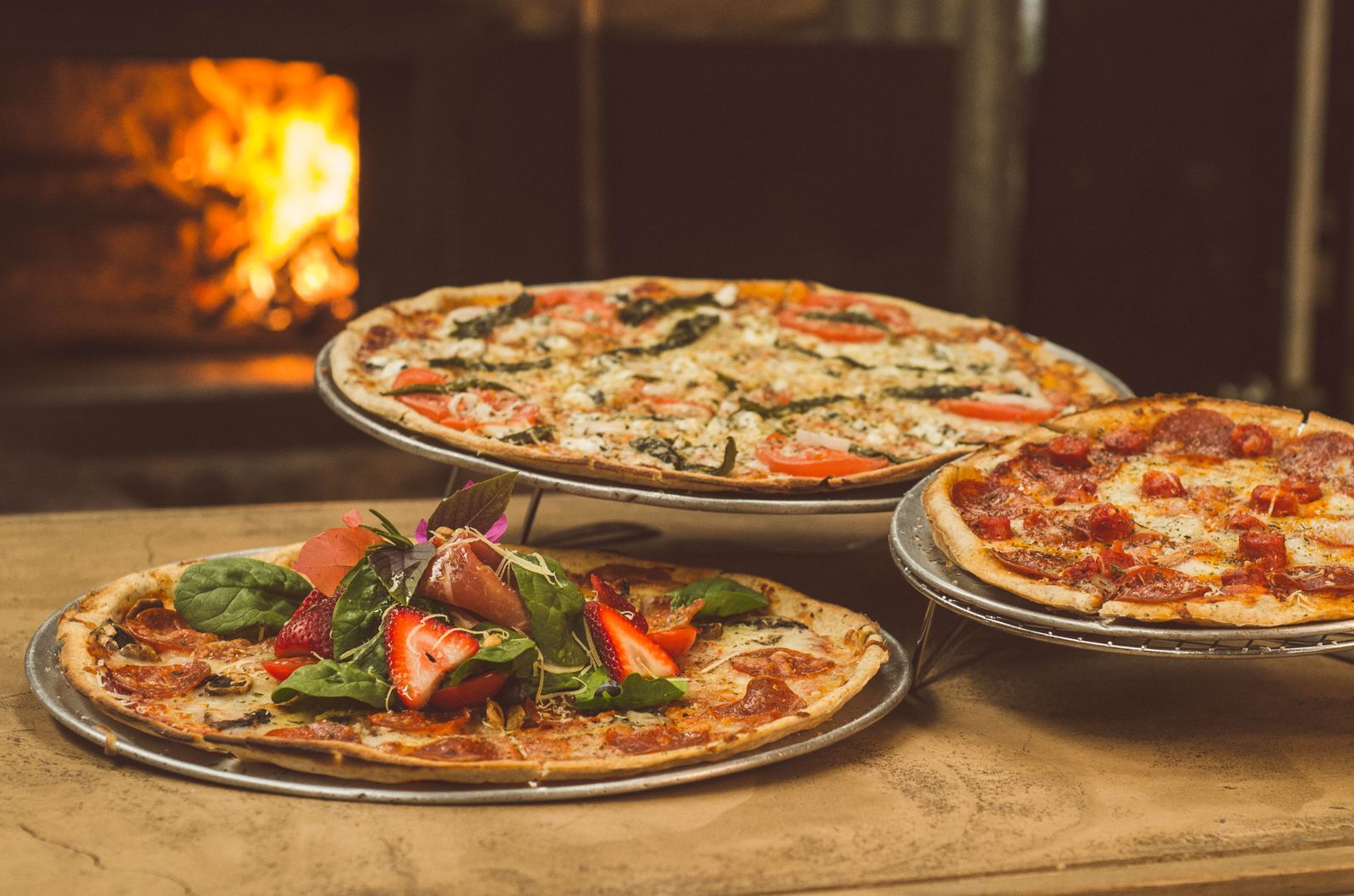 Wood-fired pizzas fresh from the oven