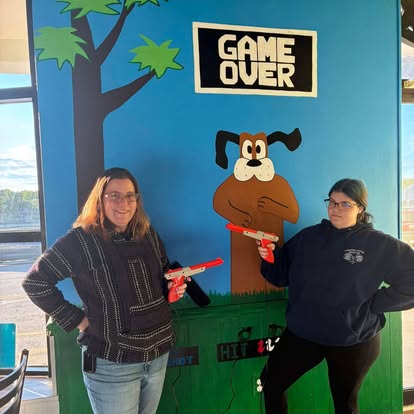 Game Over arcade mural and Duck Hunt dog wall inside Back to the 80's Diner