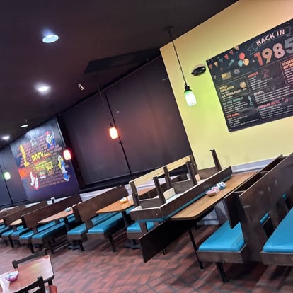 Connellsville dining room with chalkboard menu wall