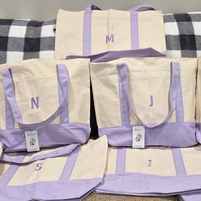 Cream and lavender canvas totes monogrammed with single initials