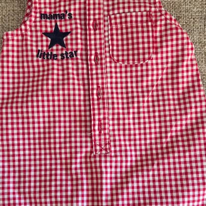 Red gingham baby romper embroidered with a navy star and 'mama's little star'
