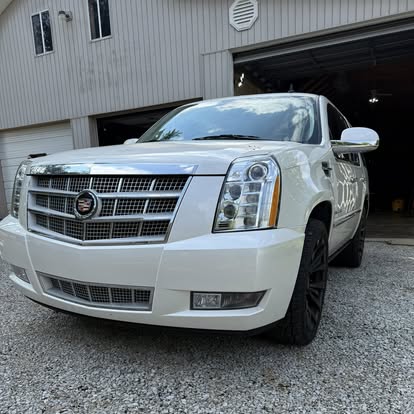 White Cadillac Escalade freshly detailed