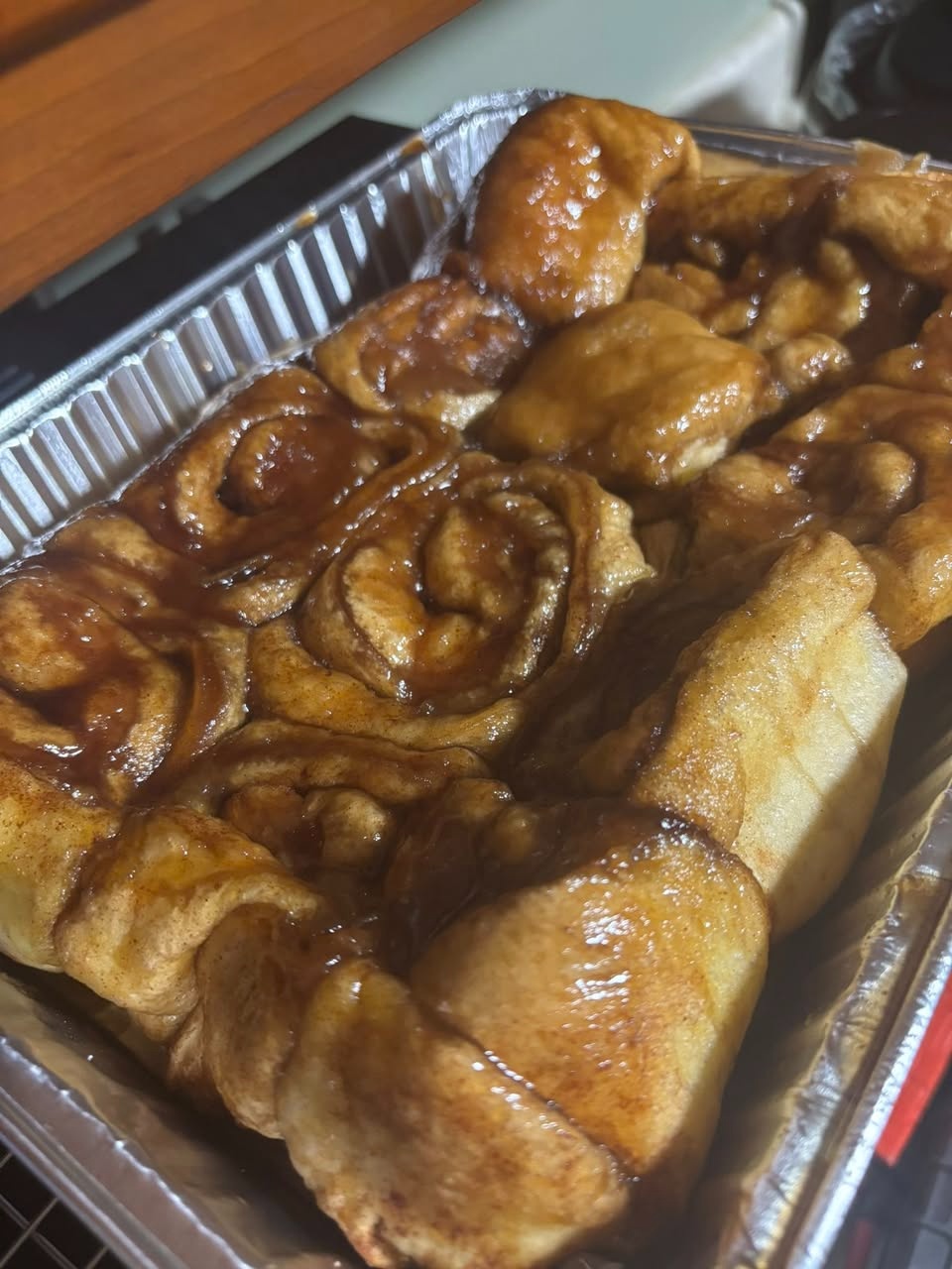 Tray of homemade sticky cinnamon rolls from The Rolling Pin