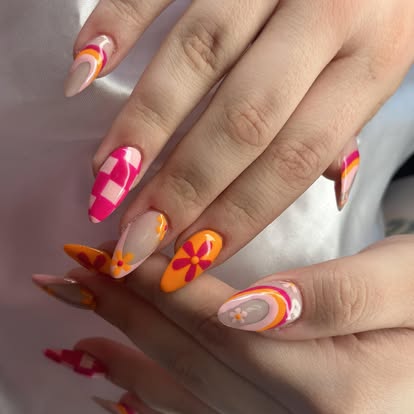 Almond nails with pink and orange retro flower nail art